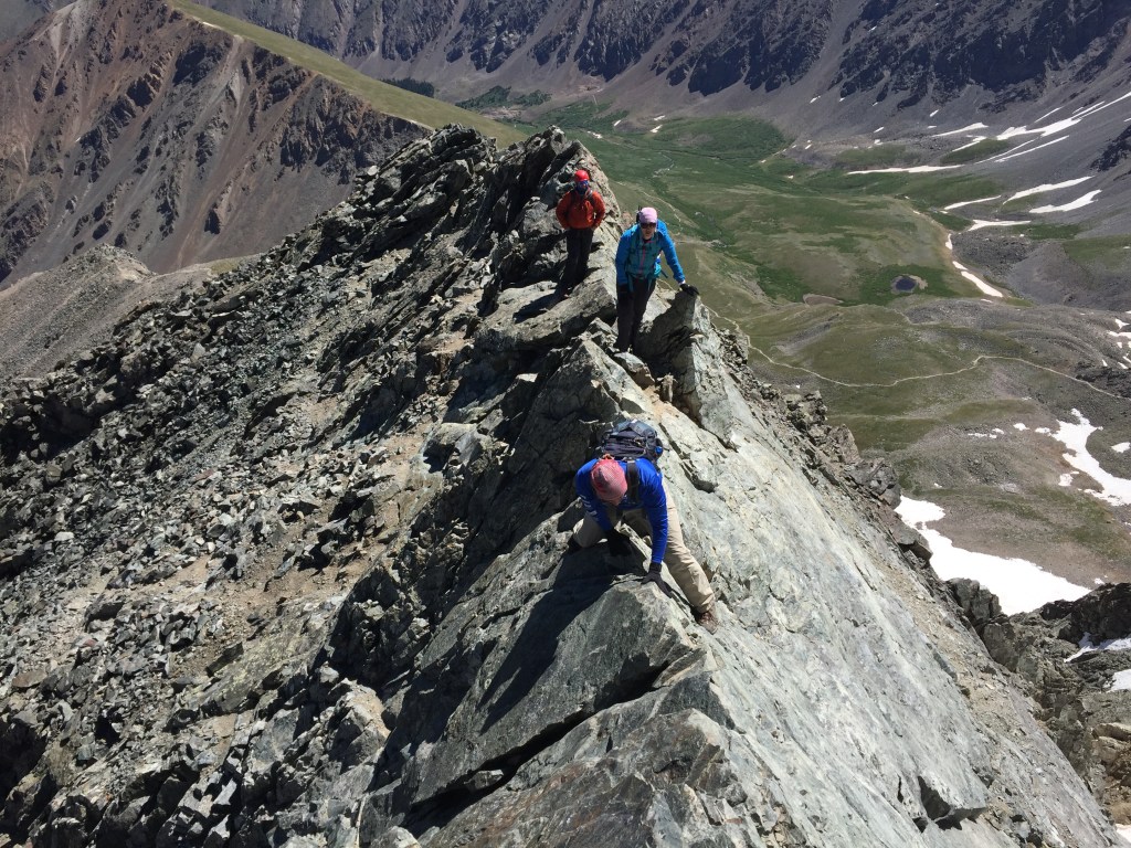 Your author crossing the knife edge. Liza waits her turn behind me.
